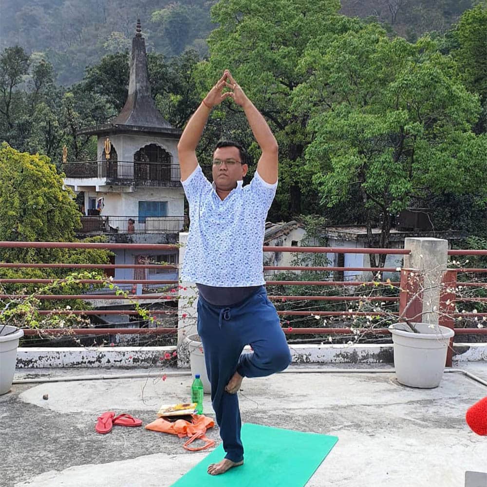 Astrologer Sailyajit Baruah doing Yoga